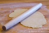 Roll out the dough on a floured surface to about 1/8 inch thick