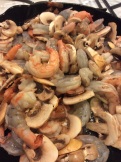 Shrimp and mushrooms starting to cook